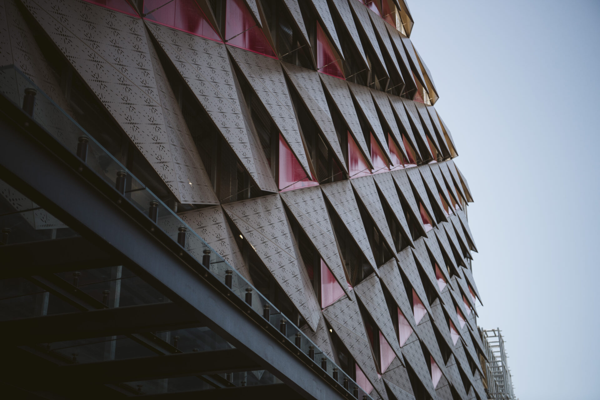 Modern building exterior featuring diamond-pattern laser-cut cladding showcasing Laser 3D precision work