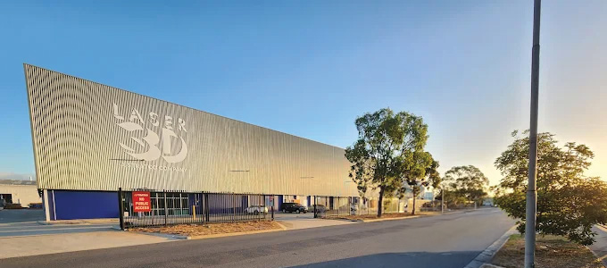 Laser 3D headquarters exterior at sunrise showcasing the company’s advanced fabrication facility in Australia.